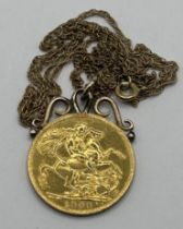 An Edward VII gold sovereign, 1909, mounted as a pendant, on a 9ct gold chain 10.4 g