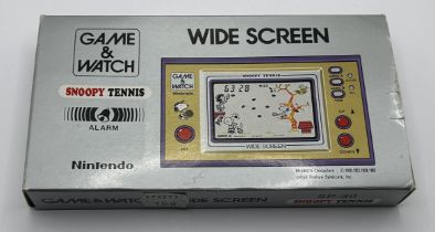 A vintage Nintendo Game & Watch, Snoopy Tennis game, boxed