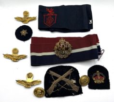 A Royal Flying Corps badge, assorted other badges buttons and items