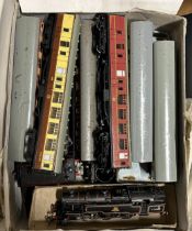 An OO gauge 2-6-4 locomotive, assorted carriages and related items (box)