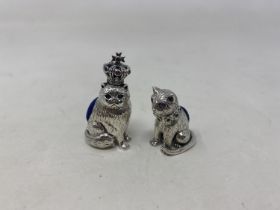 A novelty silver pin cushion, in the form of a cat, and another (2) Condition good, a 20th/21st