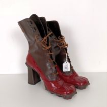 A pair of Miu Miu high heeled ankle boots, size 40