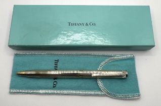 A Tiffany & Co silver ballpoint pen, with a bag, boxed