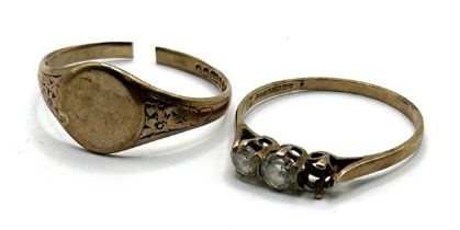 A 9ct gold signet ring, cut, and a dress ring, missing one stone (2)