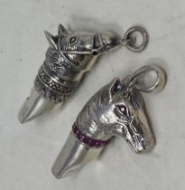 A novelty silver whistle, in the form of a horse, and another (2) Condition good, a 20th/21st