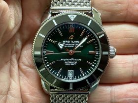 A Breitling Superocean Heritage B20 Automatic 42 green baton dial wristwatch, with a black