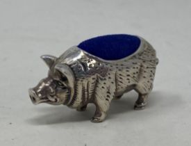 A novelty silver pincushion, in the form of a pig Condition good, a 20th/21st century copy