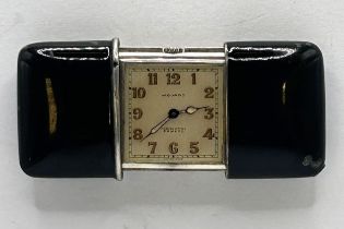 A silver Movado Ertmo purse watch, with black enamel decoration, the silvered dial with Arabic