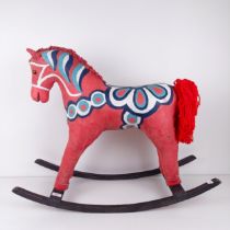 A Dala style rocking horse, 80 cm wide