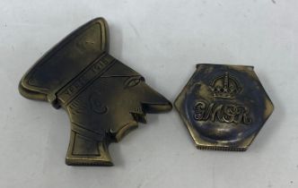 A novelty brass vesta, in the form of a sailor, and another (2) Condition good, a 20th/21st