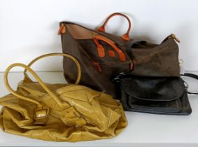 A Brics bag, an Osprey handbag, and another handbag (3)