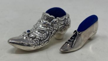 A novelty silver pin cushion, in the form of a shoe, and another (2) Condition good, a 20th/21st