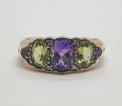 A 9ct gold, amethyst, peridot and diamond ring, ring size N Condition good, a 20th/21st century copy