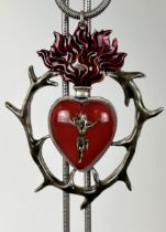 A large Jean Paul Gaultier pendant, of a flaming heart on a chain