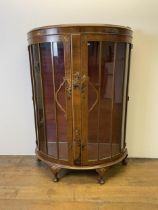 A 1920's display cabinet, with Chinoiserie style laquered decoration, 90 cm wide