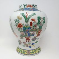 A Chinese famille verte vase, of inverted baluster form, lacking cover, 34 cm high