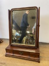 A 19th century mahogany dressing mirror, the base having three drawers, 43 cm wide