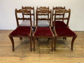 A set of six Regency style mahogany bar back dining chairs