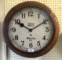 A wall clock, with a painted dial, by Smiths Enfield, 40 cm diameter