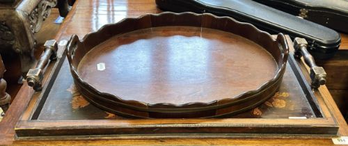 An Edwardian penwork tray, decorated a vase of flowers and birds, 69 cm wide, and a George III style