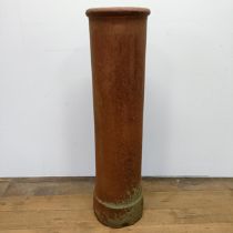 A terracotta chimney pot, 107 cm high