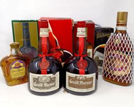 Two bottles of Grand Marnier, a bottle of Corvoisier VSOP cognac, a bottle of Crown Royal, 375 ml, a