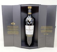 A bottle of The Macallan Rare Cask Black single malt Scotch whisky, with its cardboard box