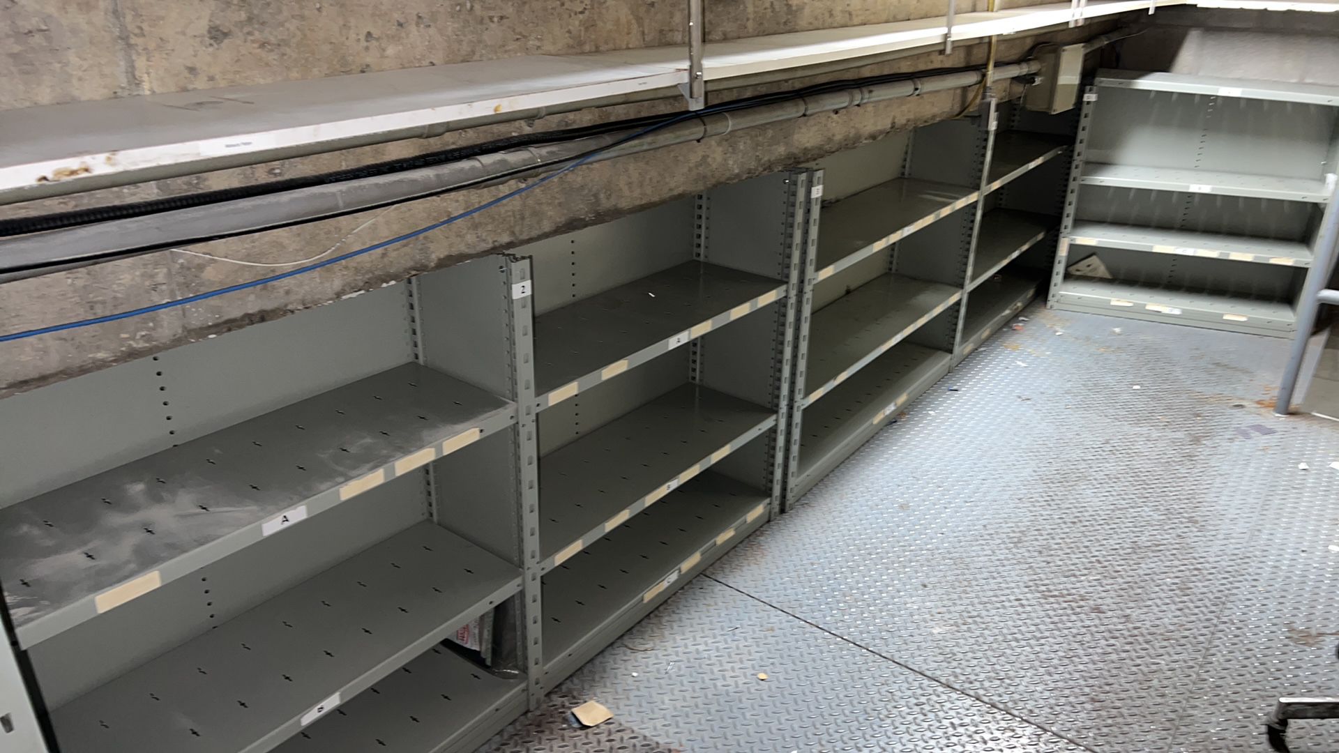 Lot of (5) Sections of 3-Level Metal Adjustable Shelving Units.