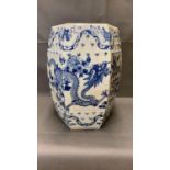 A Chinese blue and white garden seat with dragon decoration 19th century (damages), 45.5 cm high