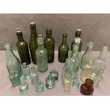 A collection of antique bottles, 24 in total