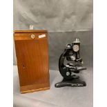 A vintage Beck of London scientific microscope in a mahogany box