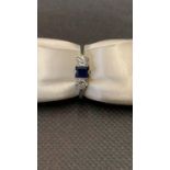 A ladies 18 carat white gold sapphire and diamond ring. Not hallmarked, tested 18 carat. The