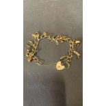 Gold Charm Bracelet, 15.6 grams