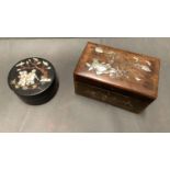 An antique oriental oak box with inlaid mother of pearl carp, flowers and butterflies, together with