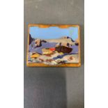 Swiss carved walnut cigarette case with an enameled white metal lid, with swiss mountain scene,