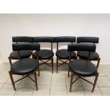 A set of 6 G-Plan dining chairs with original black vinyl seats and back rests