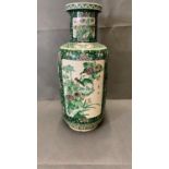 A large Chinese biscuit decorated Famille Verte vase with black ground. Kangxi mark. Probably