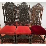 A set of 6 carved high back dining chairs
