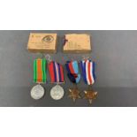 A collection of 4 WW2 service medals