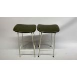 A pair of mid century Programme metal stools with vinyl seats, height 60cm