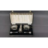 A boxed silver condiment set - total silver weight 152 grams