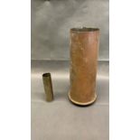 A large brass ammunition shell, 35cm high and 16cm diameter