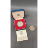 A 1977 Silver Jubilee commemorative silver crown and a 1930 George V crown