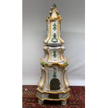A large Italian majolica terracotta parlour oven with a white, green and yellow glaze, standing 6
