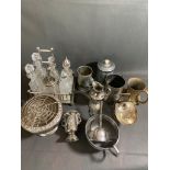 A group of silver plated and metal items