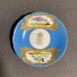 A 19th century saucer in the style of Sevres