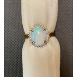 Australian solid opal and diamond cluster ring, 9 Carat, 2.4 grams