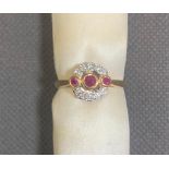 14 carat gold ring set with ruby and 10 small diamonds, 3.28 grams size Q.5, never worn