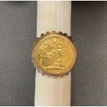 An 1899 full sovereign in a 9ct setting total weight 15 grams