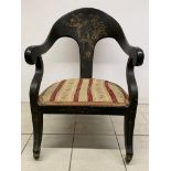 A beautifully carves chinoiserie eighteenth century black lacquered chair